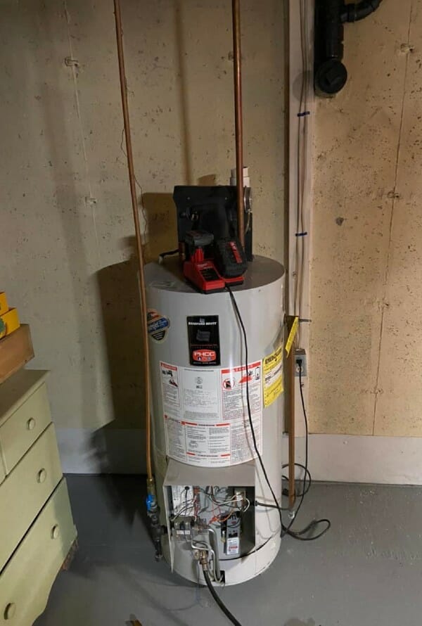 Water heater with open panel